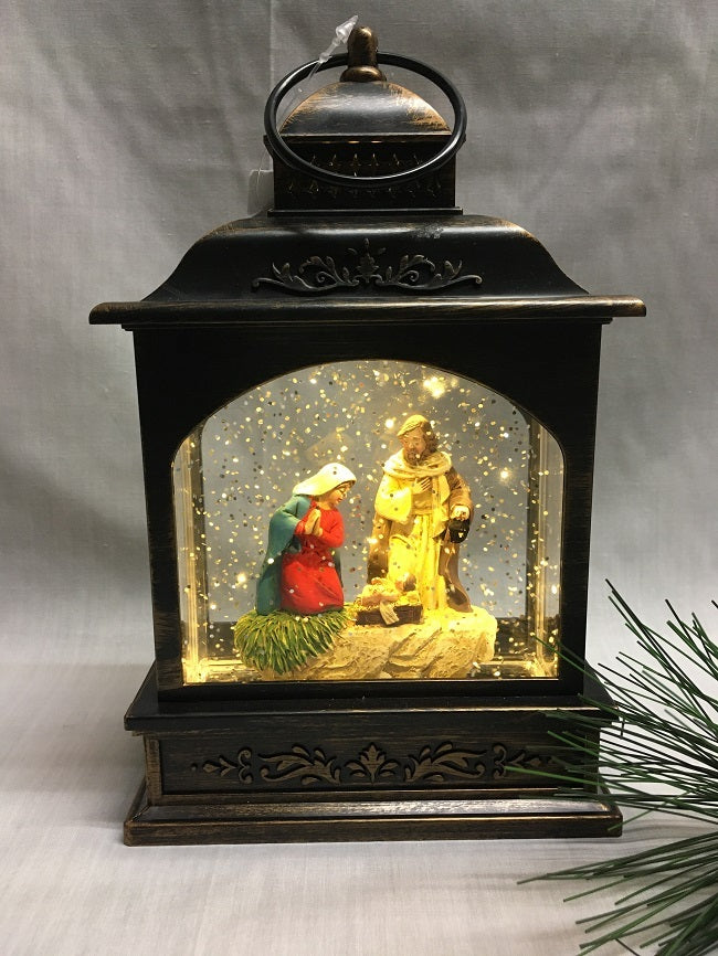 Water Lantern with Nativity Scene - 8 inches Black- Lights up and Blows glittering Snow - includes adapter cord