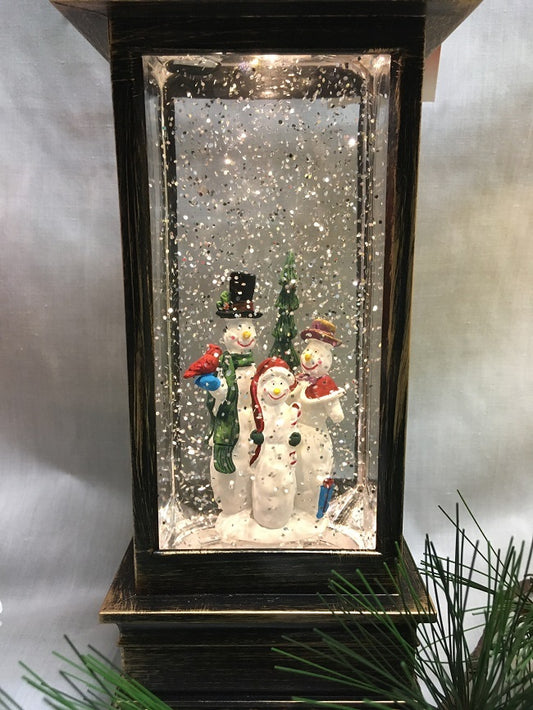 Water Lantern with Snowman Family - Bronze LED - With Timer - Lights up and Blows glittering Snow