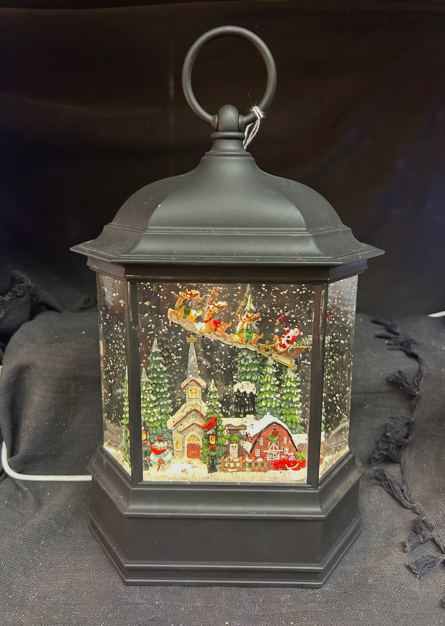 Water Lantern Santa in Sleigh Flying over Town - Black - Cord Included - Lights up and Blows Glitter