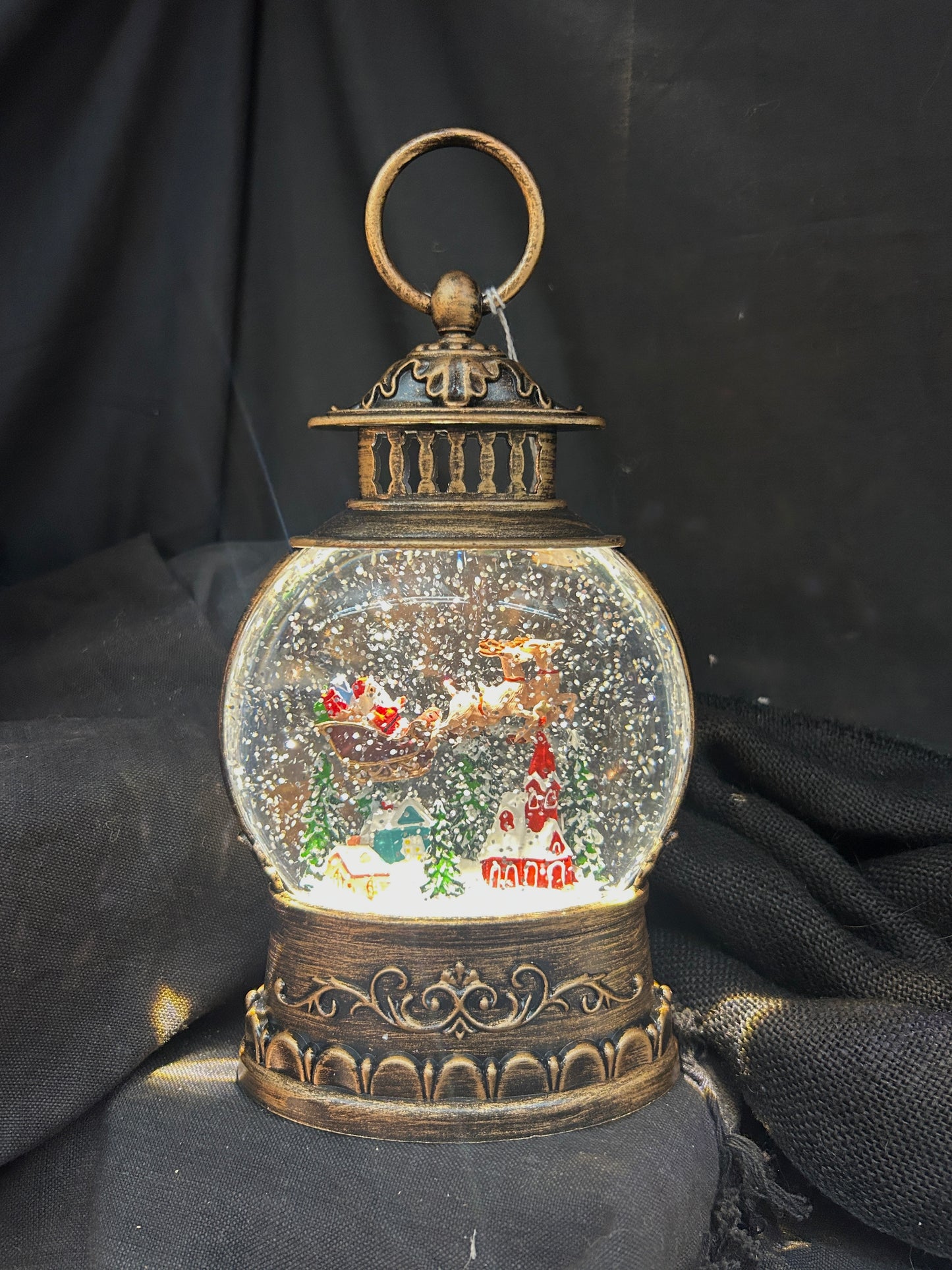 Water Lantern with Santa and Reindeer - Bronze - Lights up and Blows glittering Snow With Optional Music - includes adapter cord